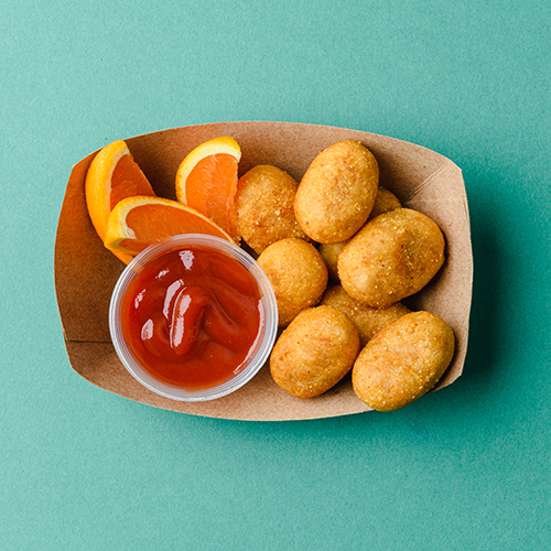 corn dogs in boat